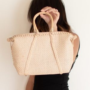 Rattan style zip bag with wood handles